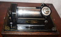 a fourth thumbnail of Edison Fireside Phonograph with red horn
