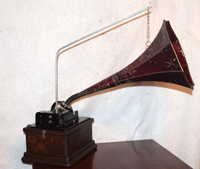 a fifth thumbnail of Edison Fireside Phonograph with red horn