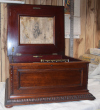 an image of 15.5 Regina music box, double comb, mahogany